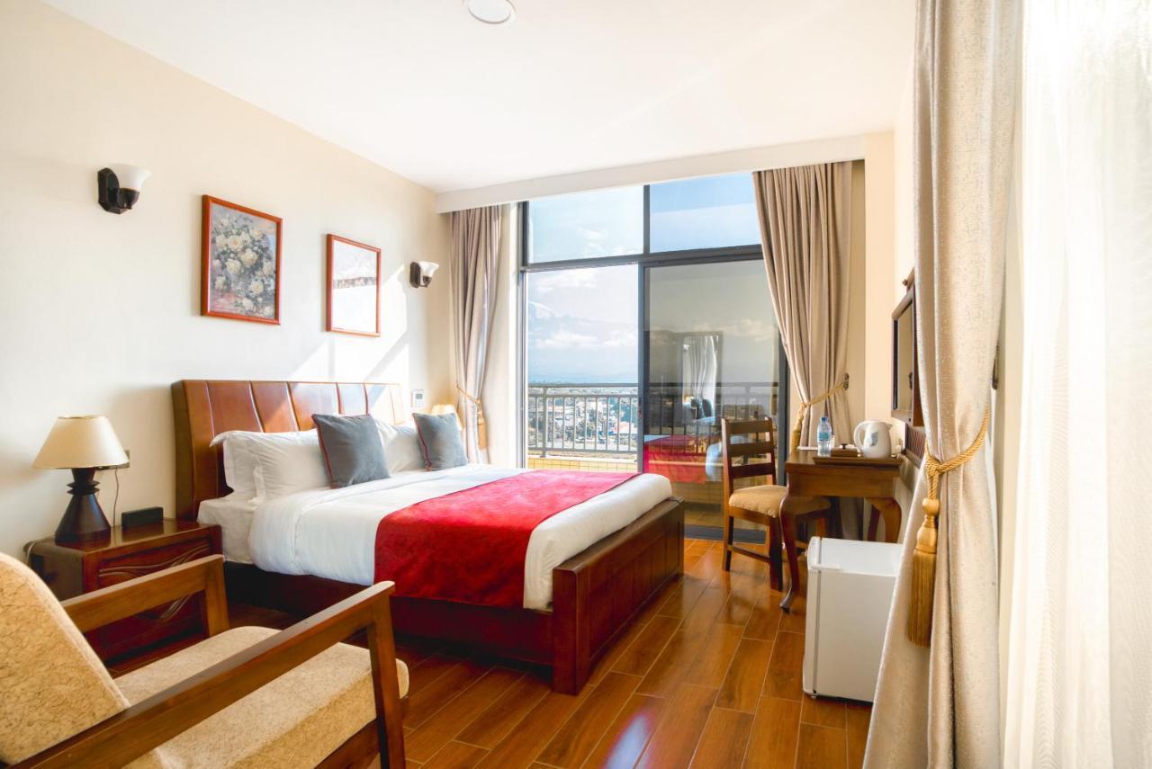 Kibo Palace Hotel Моши Экстерьер фото